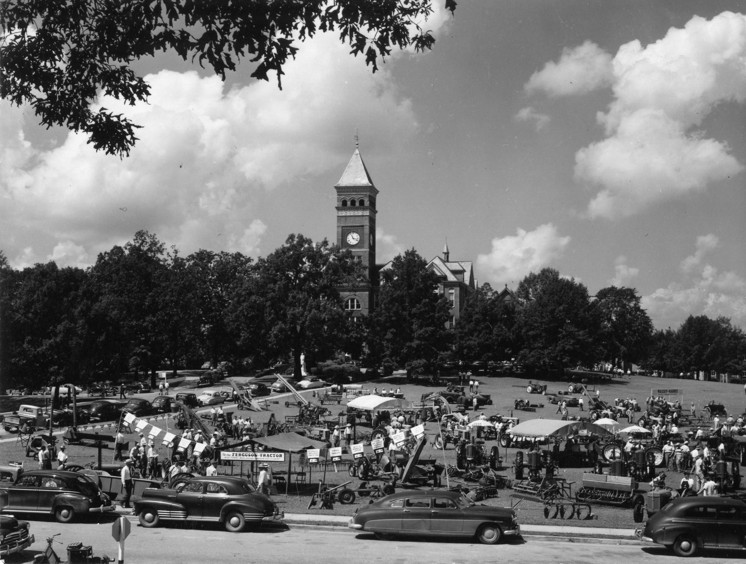 Black and white photograph of Farm machinery demonstrated at Farmers Week, August 1949. 