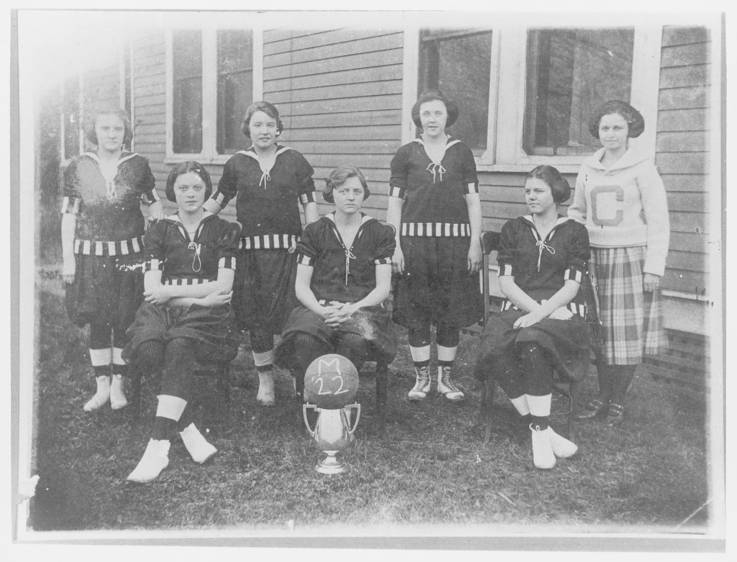 Black and white group portrait of seven women of the Monaghan Mills women's basketball team; 2nd Southern Textile Basketball Tournament
