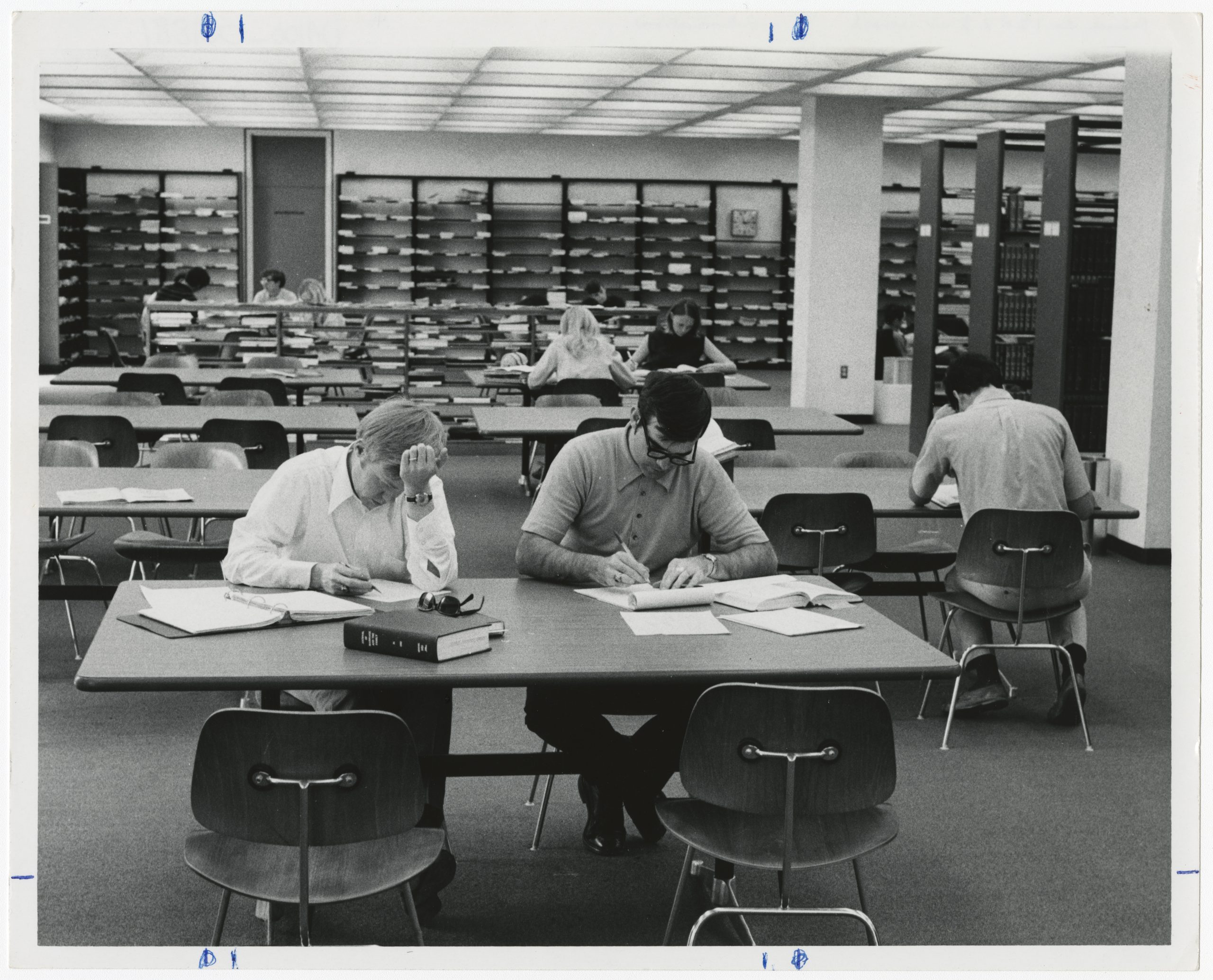 Black and white photograph of students studying in Cooper Library at Clemson University