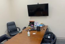 109 study room with table and chairs and wall mounted display