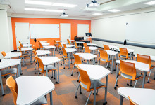 4th floor class room with desks and chairs for 30